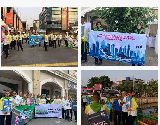 Tim kampanye #JalanHijau dengan rompi dan spanduk di trotoar Jakarta